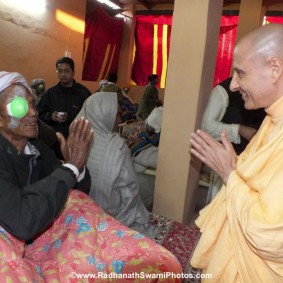 Radhanath Maharaj Visiting a Patient RadhanathSwamiinBarsanaEyeCampFebruary2012578 new 283x283 Radhanath Swami At Barsana Camp 2012