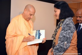 Radhanath Swami signs the journey home book