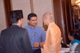 Radhanath Swami with officers at CLO Summit