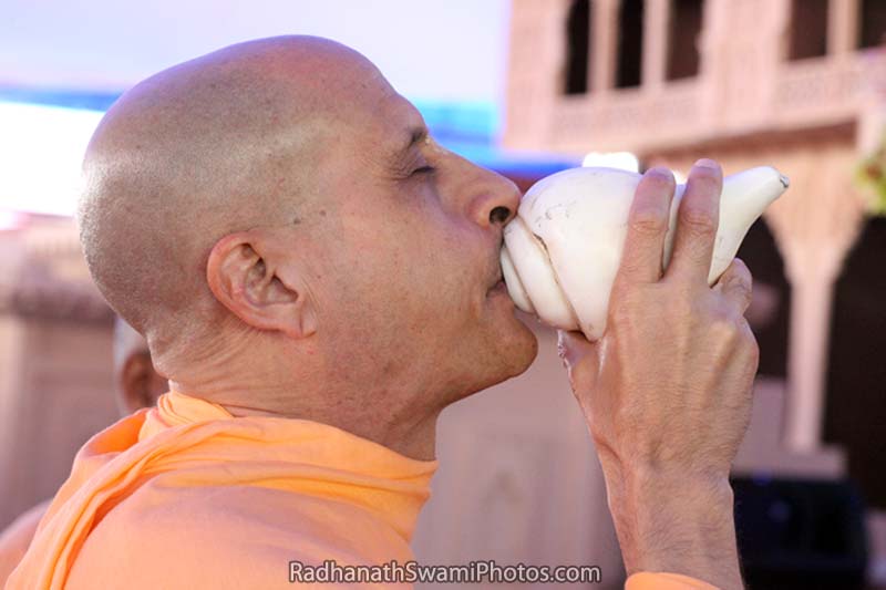 Radhanath Swami Blowing Conchshell