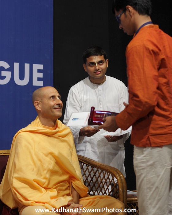 Radhanath Swami Maharaj distributes Trophy