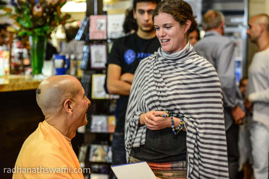 HH Radhanath Swami Signing his book The Journey home