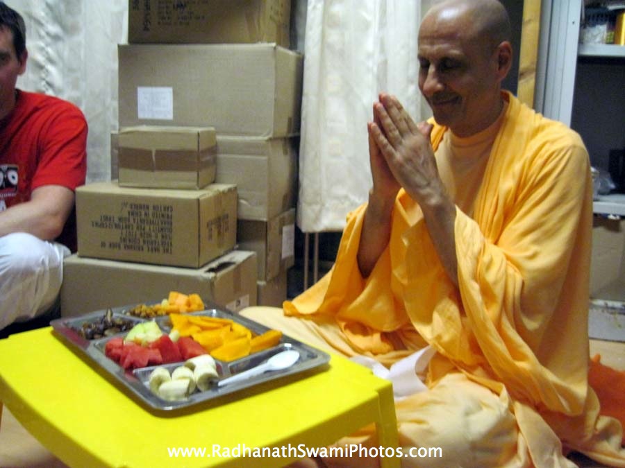 Radhanath Swami Maharaj honouring prasadam