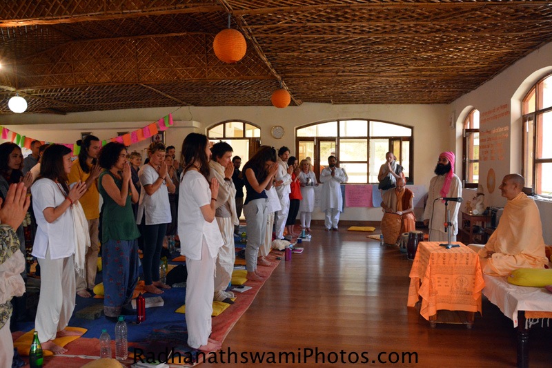 Yoga student offering respects to Radhanath Swami at Rishikesh