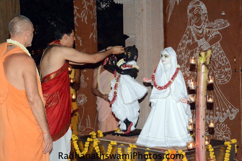 Devotee offering bhoga to Lord