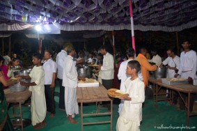 Devotees taking prasadam