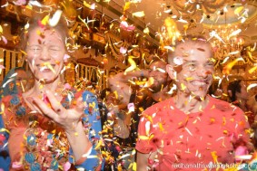 Flower petals being thrown among the people - Radhanath Swami