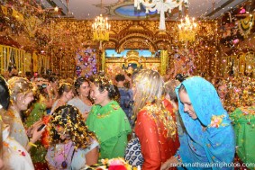 Yoga people throwing flower petals among each other - Radhanath Swami