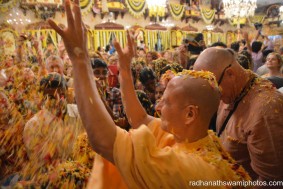 Radhanath Swami throwing flower petals