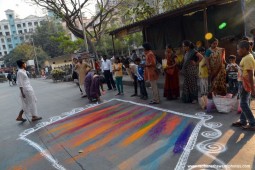 Devotees making rangoli for Lord Jagannath