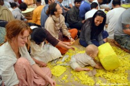 Devotees plucking flowers for pushya abhishek