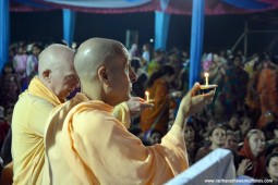 Radhanath Swami and Chandramouli Swami offering lamp to lord damodara