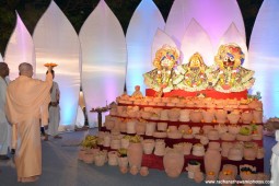 Radhanath Swami doing Arati to their lordships